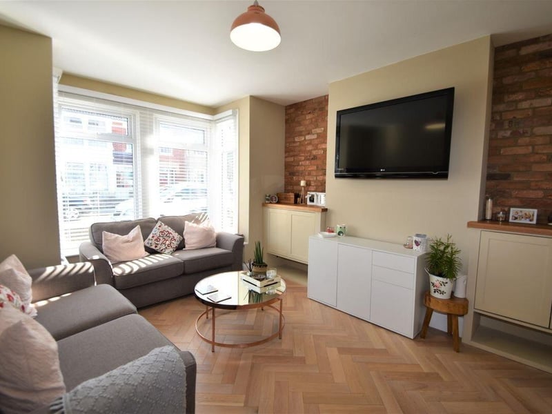 This property in Portsmouth comes with three bedrooms, two bathrooms and a reception room which is part of an open plan.