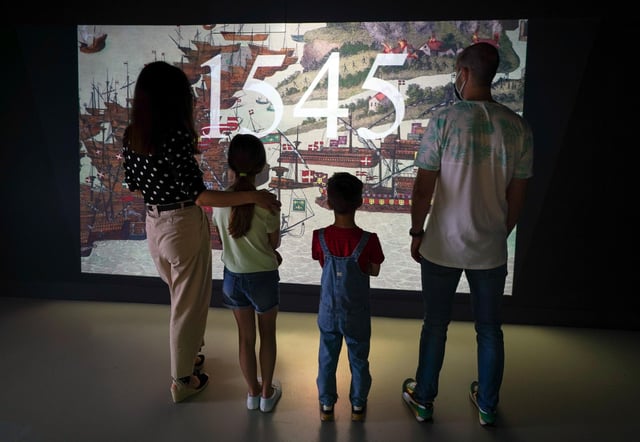 A family watches a preview of the new 1545 experience at The Mary Rose exhibition at Portsmouth Historic Dockyard. Picture: Andrew Matthews/PA Wire