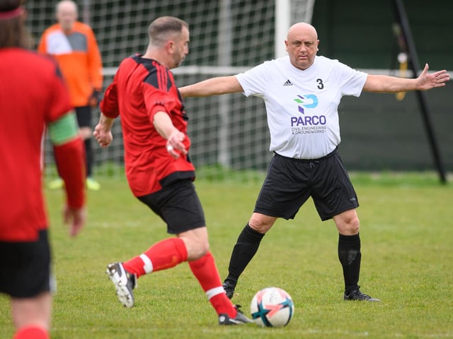 Action from the Jon Gittens memorial charity match between a team of former Fareham Town players and a side of ex-Pompey and Southampton professionals. Picture: Keith Woodland (160421-451)