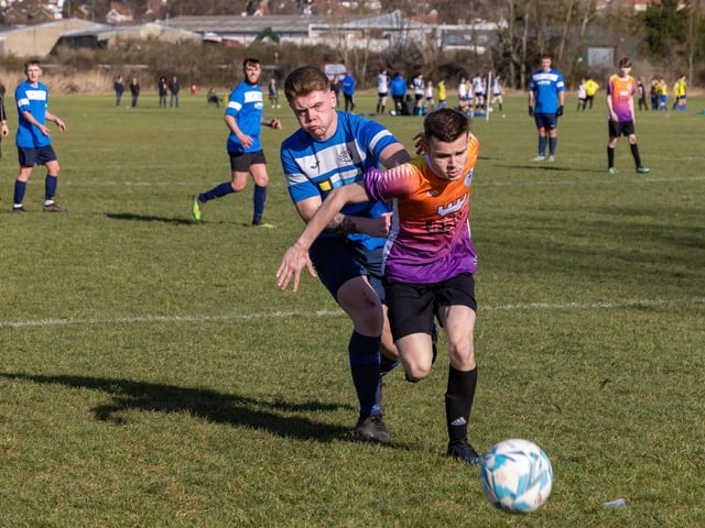 Bulldog (blue) v King George Rovers. Picture: Mike Cooter