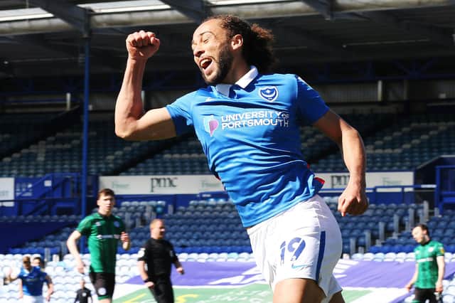 Marcus Harness celebrates Pompey's opening goal scored by Ryan Williams against Rochdale. Picture: Joe Pepler