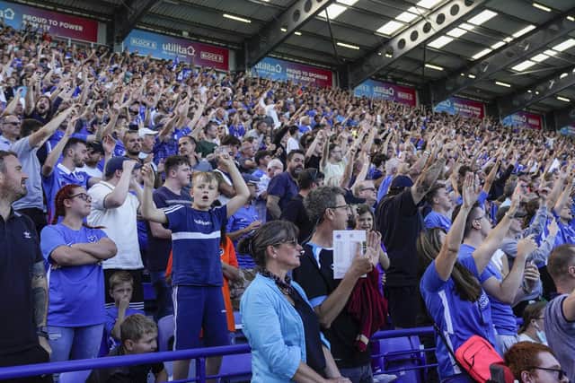 The Fratton end celebrate John Marquis' opener in Saturday's 2-0 victory of Crewe. Picture: Jason Brown/ProSportsImages