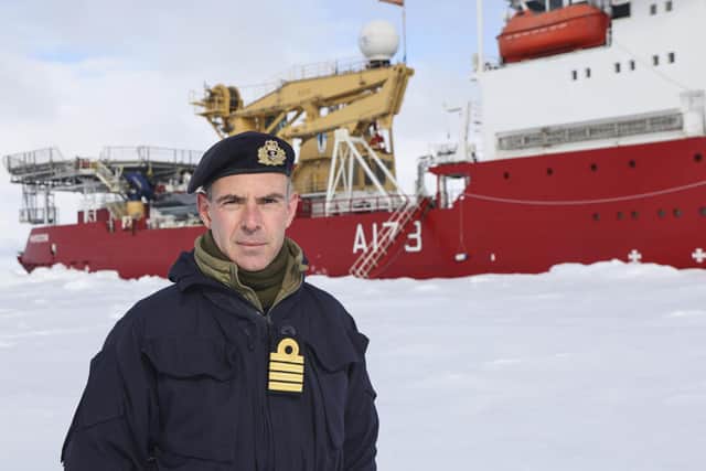 Captain Mike Wood, commanding officer of HMS Protector, on the ice while conducting trials in the Arctic. Picture: Royal Navy