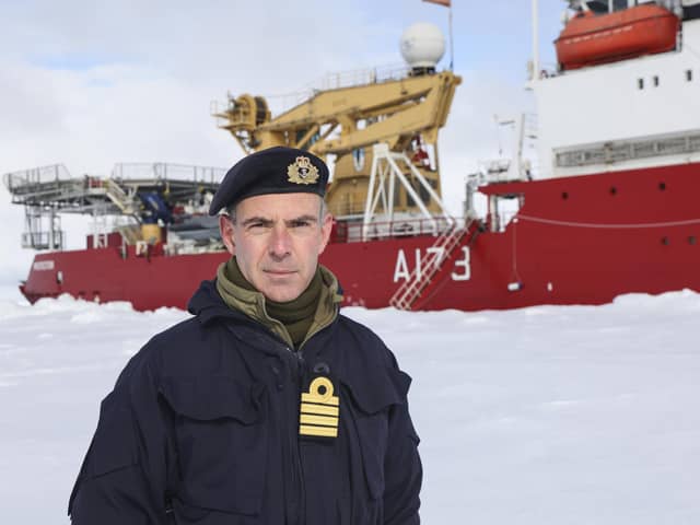 Captain Mike Wood, commanding officer of HMS Protector, on the ice while conducting trials in the Arctic. Picture: Royal Navy