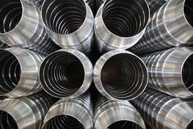 CAPTION: Parts made by Portsmouth firm Excell Metal Spinning for use in public health spraying