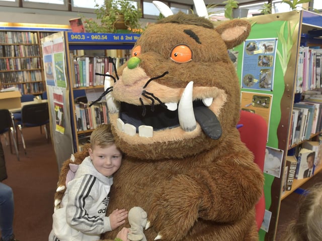A reading of the book The Gruffalo with an a appearance from The Gruffalo himself at the Alderman Lacey Library in Baffins. Pictured is: Frankie Solloway (4) from Portsmouth.
Picture: Sarah Standing (140223-9489)