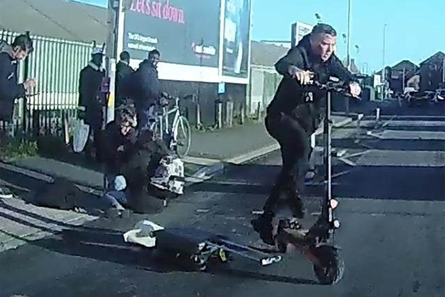 Dashcam shows Joseph Pedelty having run a red light and crashing into Raquel Delgado-Calo before getting back onto the scooter and leaving the scene.