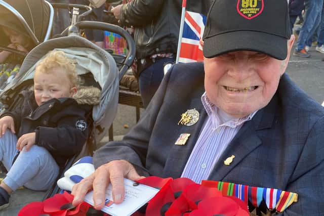 Bob giving a wreath for Dday