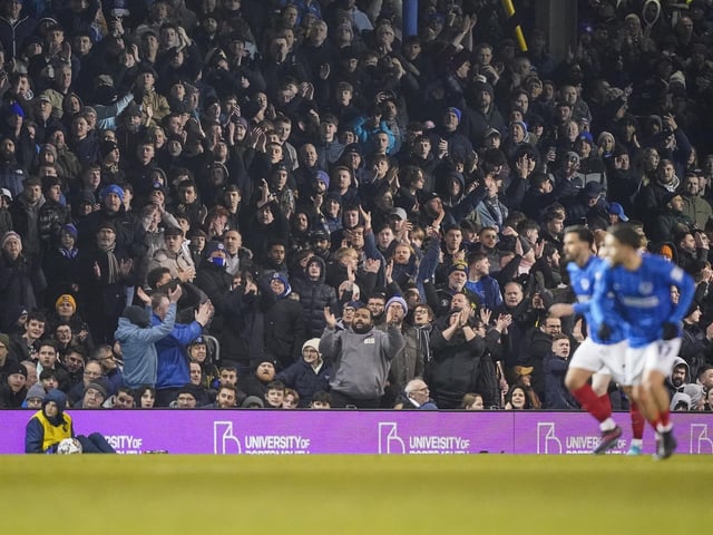 Pompey fans backed their team to a crucial Championship survival win over Cardiff last night.