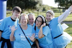 The Cummings family from Gosport, who walked in memory of their mum Eve, who died in March. Picture by Thousand Word Media/Andrew Higgins