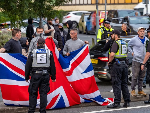 The M275 is brought to a standstill by Anti-immigration protesters. Picture: Mike Cooter (070824)