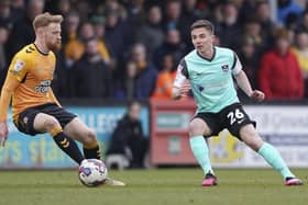 Gaffer For A Day Gary Guinness gave Tom Lowery the perfect 10 after his entrance off Pompey's bench for a first league outing since September. Picture: Jason Brown/ProSportsImages