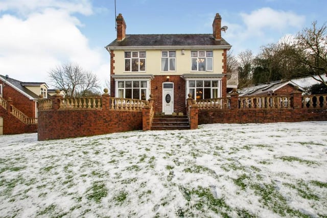 This four bedroom detached house, complete with a triple garage, costs £1,500,000.