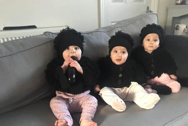 One-year-old triplets Elsie, Emmy and Addison