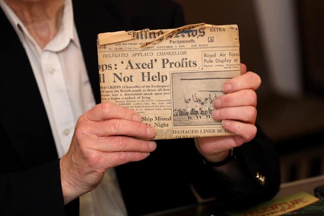 The book is covered with a copy of The News. Picture: Sam Stephenson