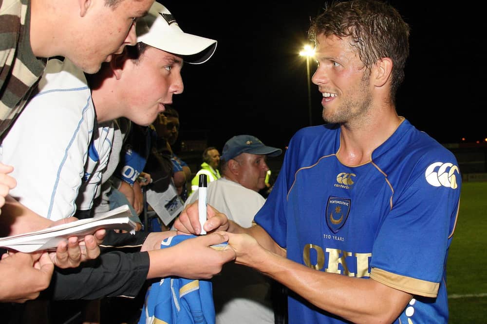 Hermann Hreidarsson after the pre-season friendly against the Hawks in 2008 signing autographs