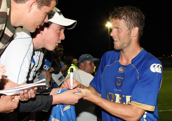 Hermann Hreidarsson after the pre-season friendly against the Hawks in 2008 signing autographs