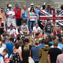 Melvyn Todd (in black cap) who stood for Reform in Portsmouth North at the 2024 general  election, addressing the crowd in Guildhall Square, Portsmouth. Some of the protestors were members of the Youth Alliance. Picture: Chris  Moorhouse (030824-36)