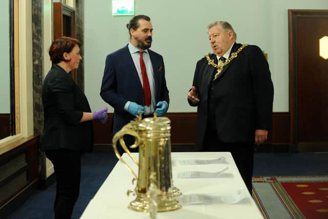 Pictured is: (l-r) Co-curators of the Silver City exhibition Susan Ward and James Daly talking to The Lord Mayor of Portsmouth Cllr Frank Jonas.
Picture: Sarah Standing (010322-4471)