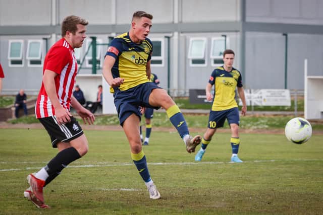 Jordan Pile (yellow/blue) has left Moneyfields to sign for Baffins Milton Rovers. Picture by Paul Collins.