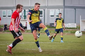 Jordan Pile (yellow/blue) has left Moneyfields to sign for Baffins Milton Rovers. Picture by Paul Collins.