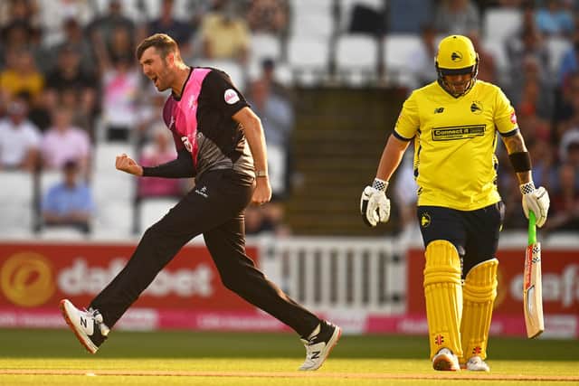 Somerset's Craig Overton of Somerset celebrates the wicket of Hampshire's Ben McDermott. Picture by Harry Trump/Getty Images
