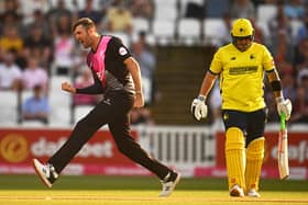 Somerset's Craig Overton of Somerset celebrates the wicket of Hampshire's Ben McDermott. Picture by Harry Trump/Getty Images