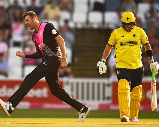 Somerset's Craig Overton of Somerset celebrates the wicket of Hampshire's Ben McDermott. Picture by Harry Trump/Getty Images