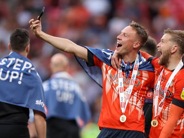 Luke Berry and Alfie Dougherty celebrate Luton's promotion to the Premier League. Picture: Alex Pantling/Getty Images