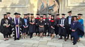 Happy students and staff at City of Portsmouth Colleges graduation ceremony.