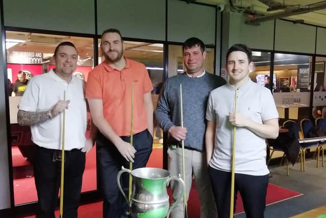 Emsworth A's Bobby Terry, third from left, hit a match-high break of 31 in his team's Peter Rook Cup battle with Craneswater A