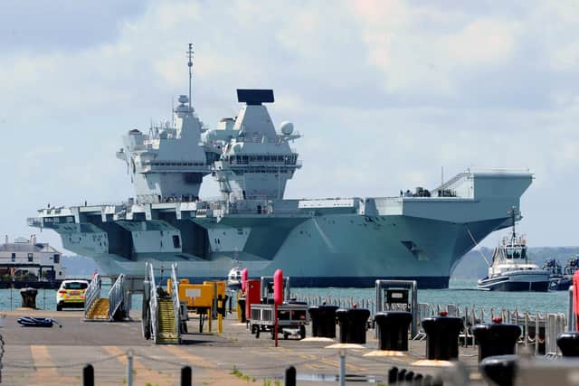 Britain's biggest warship HMS Queen Elizabeth pictured returning to Portsmouth after 10 weeks at sea, carrying out critical training.
Picture: Sarah Standing (020720-5149)