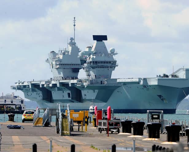 Britain's biggest warship HMS Queen Elizabeth pictured returning to Portsmouth after 10 weeks at sea, carrying out critical training.Picture: Sarah Standing (020720-5149)