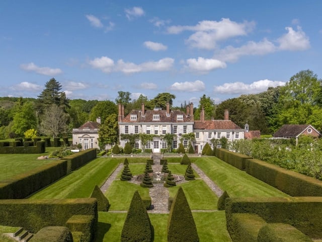 This Grade II listed Winchester home has ten bedrooms, seven bathrooms and seven reception rooms and it is in a protected parkland area.