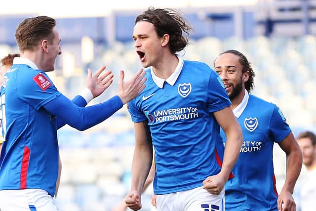 Rasmus Nicolaisen celebrates opening the scoring for Pompey against King's Lynn
