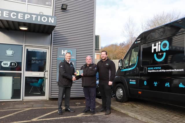 Craig Sprigmore, Goodyear Retail Director UK & Ireland, congratulating Reg Gray and John Bridle, co-owners of HiQ Havant