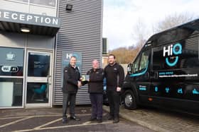 Craig Sprigmore, Goodyear Retail Director UK & Ireland, congratulating Reg Gray and John Bridle, co-owners of HiQ Havant