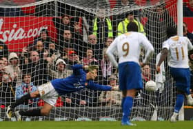 Stand-in goalkeeper Rio Ferdinand cannot keep out Sulley Muntari's penalty as Manchester United were knocked out of the FA Cup by Pompey in March 2008. Picture: Richard Heathcote/Getty Images.