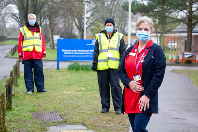 Pictured: Vaccination lead, Stephanie Clark with fellow volunteers, Nick Leacver and Linda Swinburne outside St James Hospital, Portsmouth on 17 February 2021

Picture: Habibur Rahman