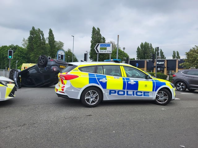 Car flips in Burrfields Road crash