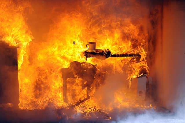 Hampshire Fire & Rescue Arson Task Force gave 'live burn' demonstrations to the media and CSI staff from other public services in 2017. Picture:  Malcolm Wells (170922-8944)