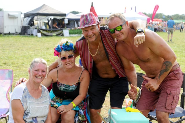 Wickham Festival 2024 got underway at their new arena site in Shedfield on Thursday, August 1. 

Pictured is: (l-r) Angie Barry from Portchester, Jasmine Malzard and Dave Malzard from Southsea with Paul Barry from Portchester, celebrating his 50th birthday.

Picture: Sarah Standing (010824-2932)