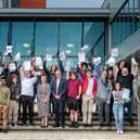 Andrew Kaye, CEO of South Hampshire College Group, and Ashley Martin, Director of student experience and transition at the group celebrate successful Level 3 and T Level results with students at Fareham College