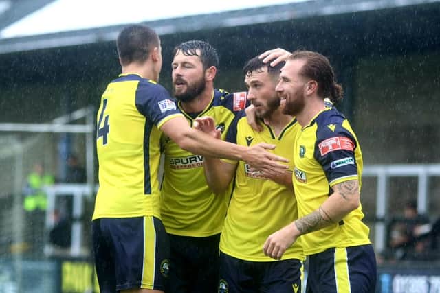 Gosport celebrate Bradley Tarbuck's opener at Dorchester. Picture: Tom Phillips