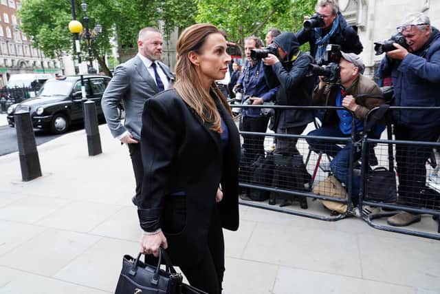 Wayne and Coleen Rooney arrive at the Royal Courts Of Justice, London, as the high-profile libel battle between Rebekah Vardy and Coleen Rooney is finally set to go to trial. Picture: Ian West/PA Wire