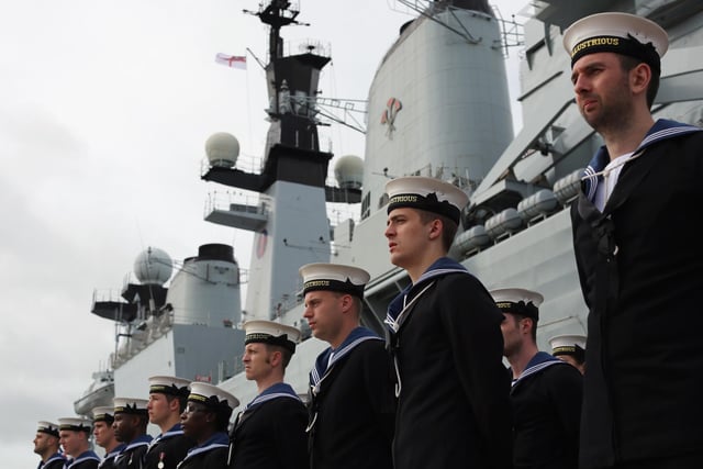 Company of the HMS Illustrious stand in formation during her decommissioning ceremony on August 28, 2014 in Portsmouth. Photo by Dan Kitwood/Getty Images