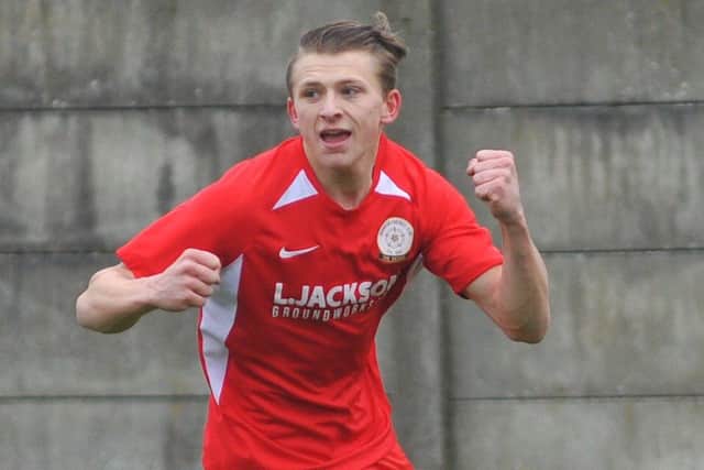 Zack Willett celebrates his 24th Wessex League goal of the season. Picture: Martyn White