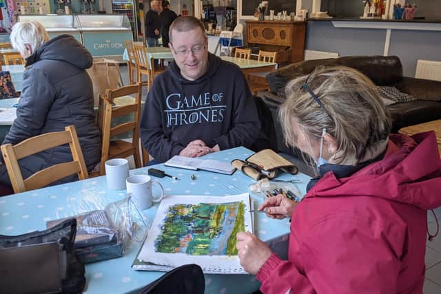 The urban sketchers inside the cafe at Canoe Lake. Picture: Emily Turner