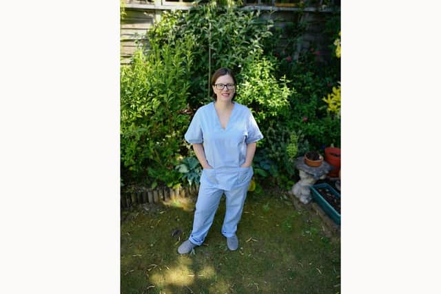 Crofton School textiles teacher, Laura Griffiths, dressed in one of the scrubs she has been making for NHS workers.