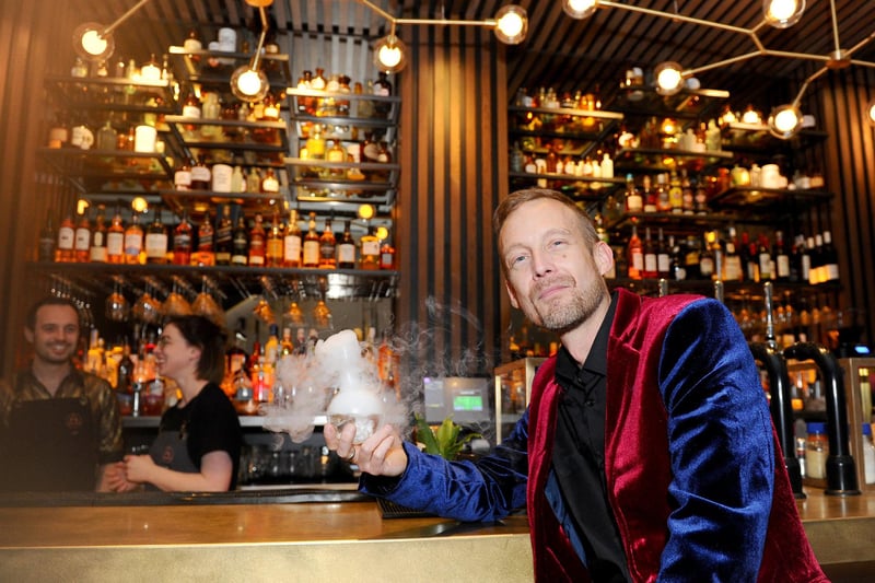 A bar serving cocktails with smoke pouring out of them - it could only be one place!